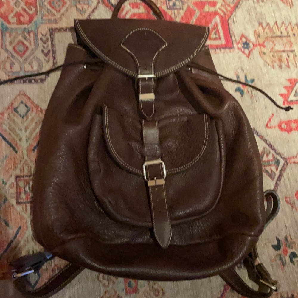 Brown leather roots backpack